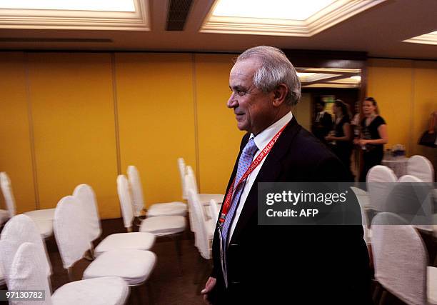 International Hockey Federation President Leandro Negre walks out of a near empty press conference venue in New Delhi on February 27, 2010. Several...