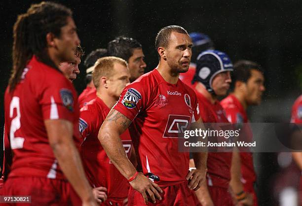 Quade Cooper of the Reds watches on as the Blues convert a try during the round three Super 14 match between the Queensland Reds and the Blues at...