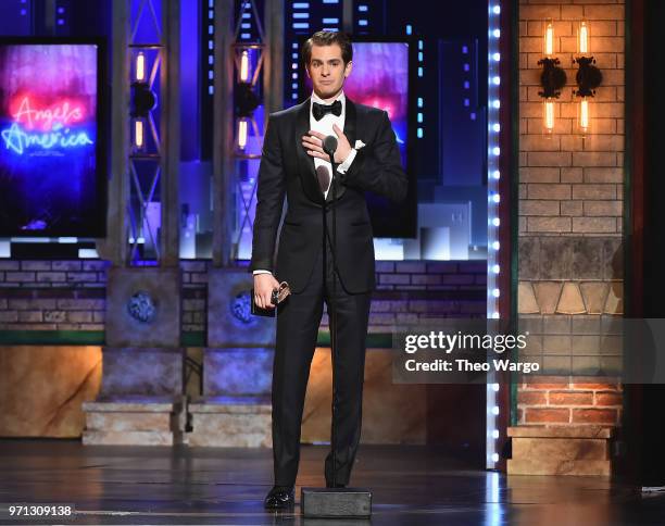 Andrew Garfield accepts the Best Performance by an Actor in a Leading Role in a Play for Angels in America onstage during the 72nd Annual Tony Awards...