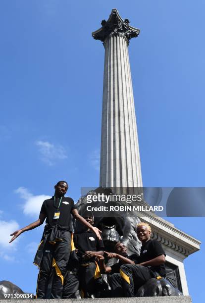 Members of the Matabeleland team pose in Trafalgar square as they take part in a sightseeing tour of London on the sidelines of the alternative World...