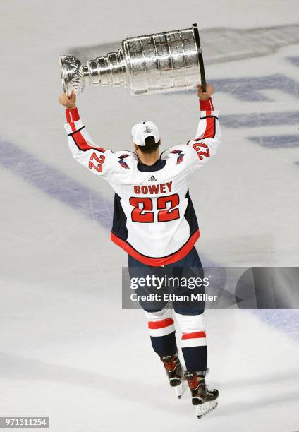 Madison Bowey of the Washington Capitals hoists the Stanley Cup after Game Five of the 2018 NHL Stanley Cup Final at T-Mobile Arena on June 7, 2018...