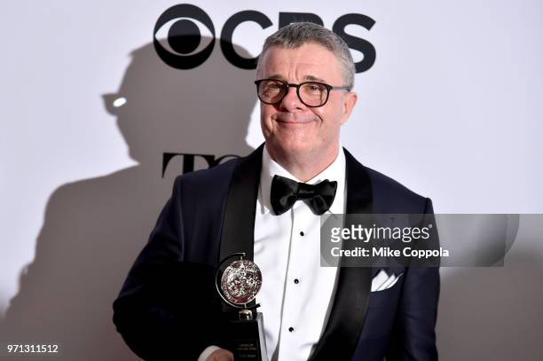 Nathan Lane, winner of the award for Best Performance by an Actor in a Featured Role in a Play for "Angels in America," poses in the 72nd Annual Tony...