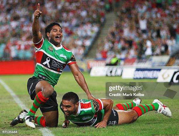 Chris Sandow of the Rabbitohs celebrates after Nathan Merritt of the Rabbitohs scored a try during the NRL Charity Shield match between the South...