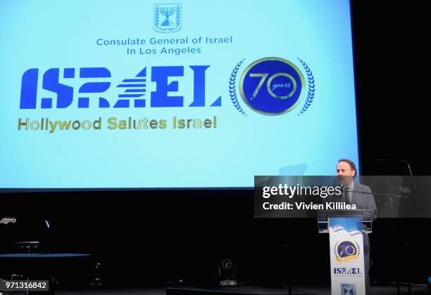 Billy Crystal speaks onstage during the 70th Anniversary of Israel celebration in Los Angeles on Sunday, June 10, 2018.