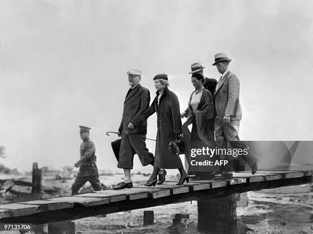 Russian Leon Trotsky , accompagnied by his wife Natalia Sedova , is greeted by Mexican painter Frida Kahlo upon his arrival in Mexico, 9th January...