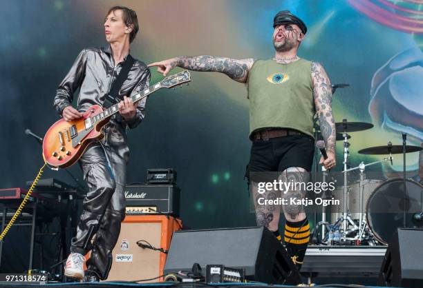 Tony Sylvester and Knut Schreiner of the Norwegian band Turbonegro perform at Download Festival at Donington Park on June 10, 2018 in Castle...