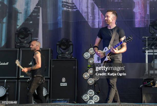 Guitarist Zach Blair and singer Tim McIlrath of the band Rise Against perform at Download Festival at Donington Park on June 10, 2018 in Castle...