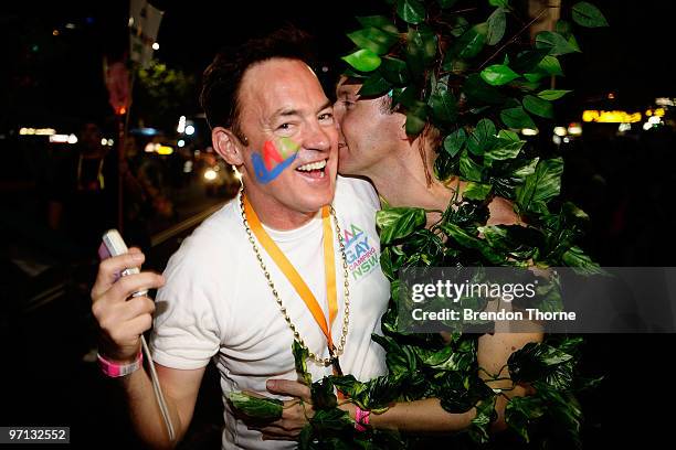 Parade goers dance during the annual Sydney Gay and Lesbian Mardi Gras Parade on Oxford Street on February 27, 2010 in Sydney, Australia. The annual...