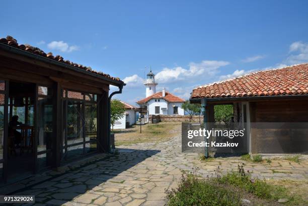 the lighthouse and other buildings in st. anastasia island - red beacon stock pictures, royalty-free photos & images
