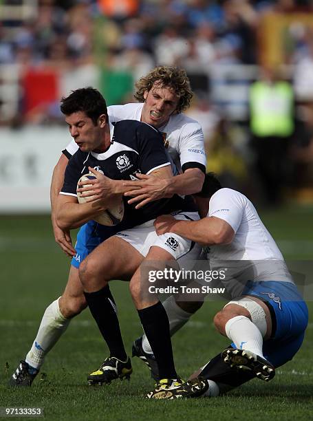 Hugo Southwell of Scotland is tackled by Mirco Bergamasco of Italy during the RBS 6 Nations match between Italy and Scotland at the Stadio Flaminio...