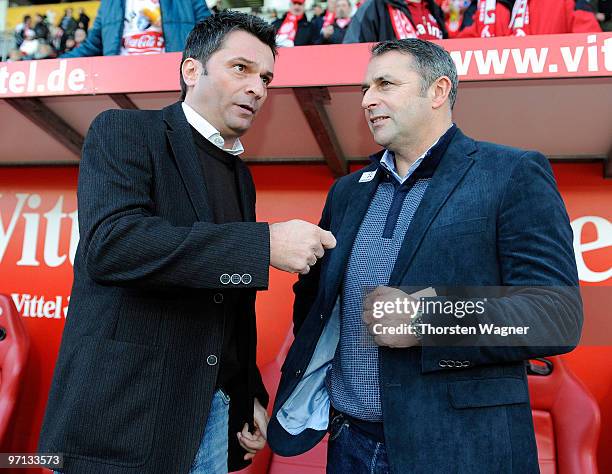 Manager Christian Heidel of Mainz talks to manager Klaus Allofs of Bremen during the Bundesliga match between FSV Mainz 05 and SV Werder Bremen at...