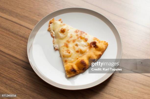 four cheese pizza on a white plate - white pizza stock pictures, royalty-free photos & images