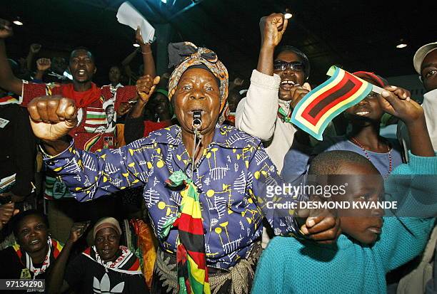 Supporters of Zimbabwean President Rorbet Mugabe dance on February 27, 2010 during celebrations to mark his 86th birthday in Bulawayo. Mugabe turned...