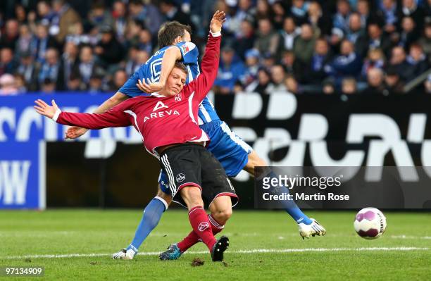 Christoph Dabrowski of Bochum and Mike Frantz of Nuernberg compete for the ball during the Bundesliga match between VFL Bochum and 1. FC Nuernberg at...
