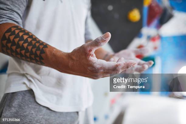 sports and bouldering training, hands close up. - sports chalk stock pictures, royalty-free photos & images