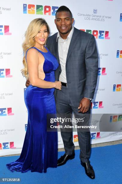 Andrea de la Torre and Yasiel Puig attend a private celebration of The 70th Anniversary of Israel hosted by the Consul General of Israel, Los...