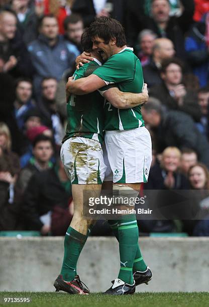 Tommy Bowe of Ireland is congratulated by Donncha O'Callaghan of as he scores a try during the RBS Six Nations match between England and Ireland at...