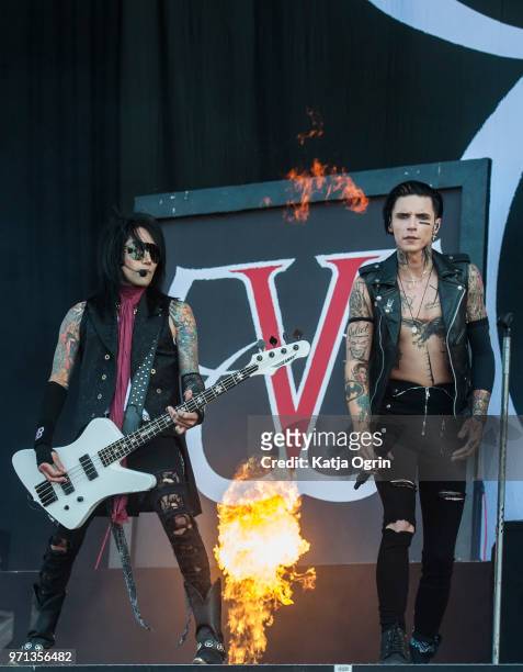 Andy Biersack and Ashley Purdy of Black Veil Brides perform at Download Festival at Donington Park on June 10, 2018 in Castle Donington, England.