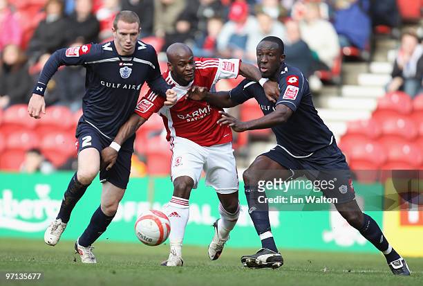 Leroy Lita of Middlesbrough is tackled by Peter Ramage and Damion Steward of QPR during the Coca-Cola Championship match between Middlesbrough and...