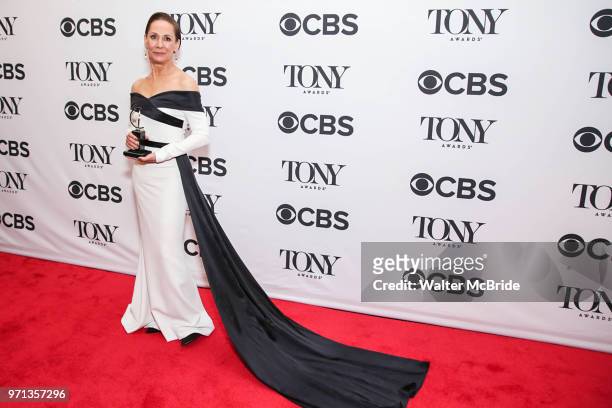 Laurie Metcalf, winner of the award for Best Performance by an Actress in a Featured Role in a Play for Three Tall Women poses the 72nd Annual Tony...