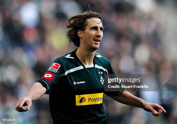 Roel Brouwers of Moenchengladbach celebrates scoring his goal during the Bundesliga match between Borussia Moenchengladbach and SC Freiburg at...