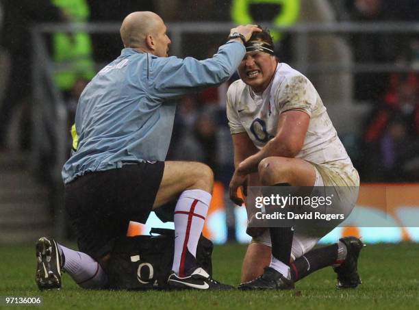 Dylan Hartley of England is given some treatment during the RBS Six Nations match between England and Ireland at Twickenham Stadium on February 27,...