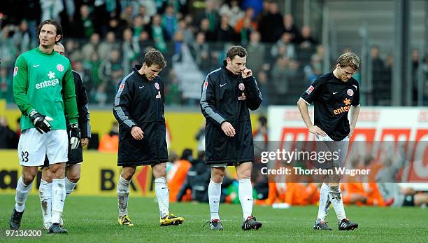 Heinz Mueller, Radoslav Zabavnik, Jan Simak and Eugen Polanski leave the pitch after loosing the Bundesliga match between FSV Mainz 05 and SV Werder...