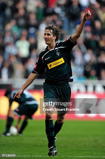 Roel Brouwers of Moenchengladbach celebrates scoring his goal during the Bundesliga match between Borussia Moenchengladbach and SC Freiburg at...