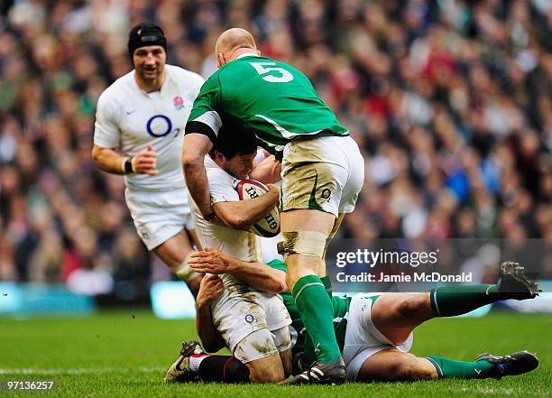 Danny Care of England is stopped by Paul O'Connell of Ireland during the RBS Six Nations match between England and Ireland at Twickenham Stadium on...