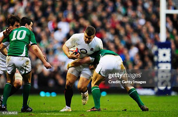 Nick Easter of England breaks through the Irleand defence during the RBS Six Nations match between England and Ireland at Twickenham Stadium on...