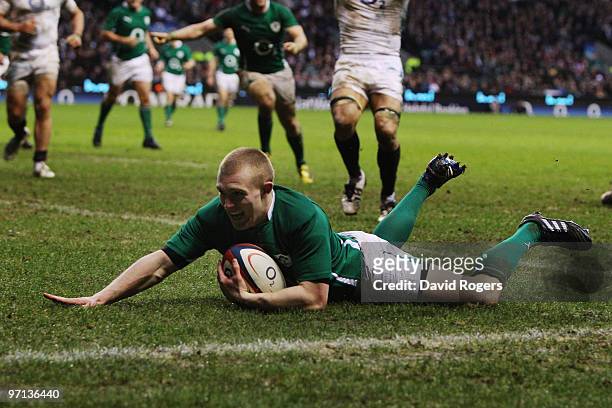 Keith Earls of Ireland goes over for try during the RBS Six Nations match between England and Ireland at Twickenham Stadium on February 27, 2010 in...