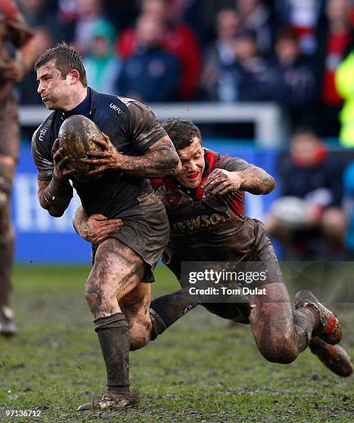 Oriol Ripol of Sale Sharks is challenged by Tim Molenaar of Gloucester during the Guinness Premiership match between Gloucester and Sale Sharks at...