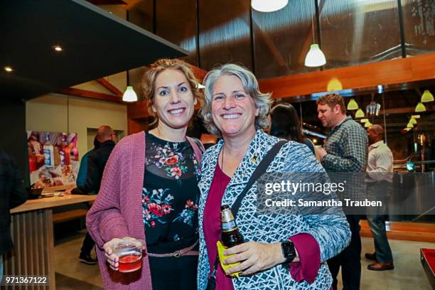 Guests attend GenR: LA Force for Change Photo Exhibition hosted by GenR and the International Rescue Committee at GreenBar Distillery on June 7, 2018...