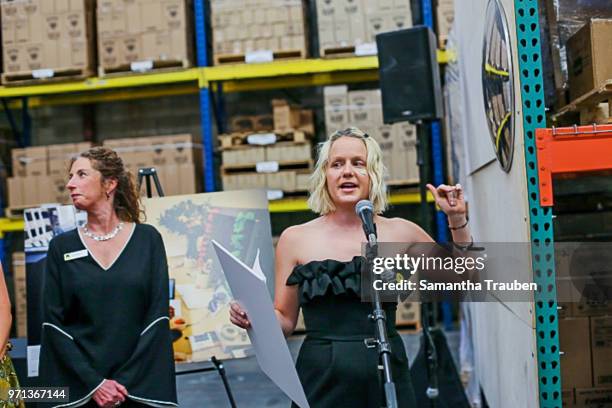 Samantha Becker speaks at GenR: LA Force for Change Photo Exhibition hosted by GenR and the International Rescue Committee at GreenBar Distillery on...