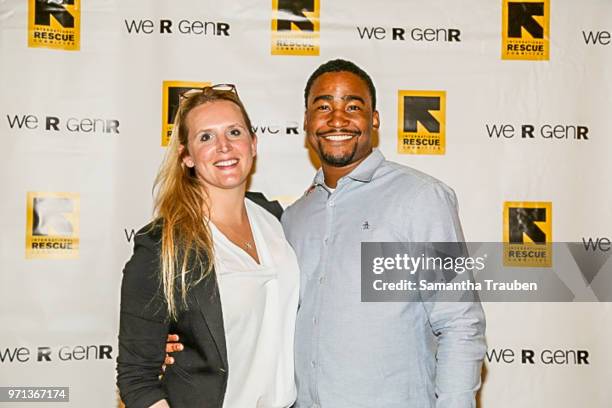 Guests attend GenR: LA Force for Change Photo Exhibition hosted by GenR and the International Rescue Committee at GreenBar Distillery on June 7, 2018...