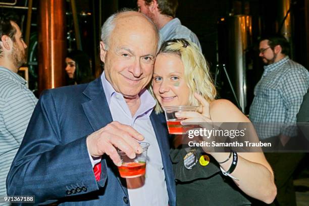 Samantha Becker and Bob Bookman attend GenR: LA Force for Change Photo Exhibition hosted by GenR and the International Rescue Committee at GreenBar...