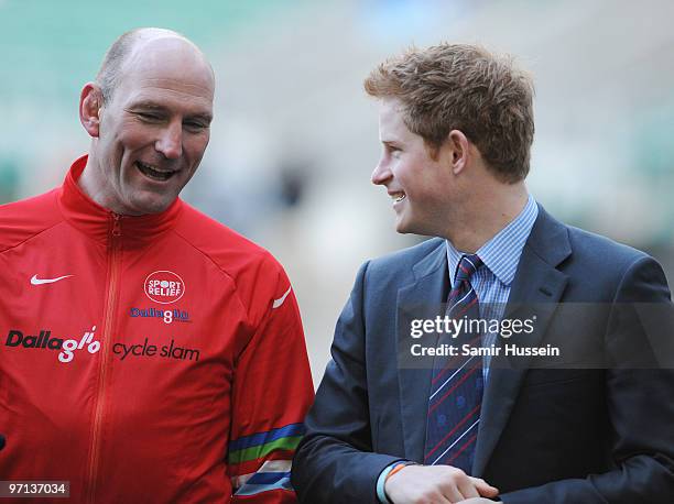 Prince Harry and former England rugby player Lawrence Dallaglio arrive at Twickenham Stadium to welcome back cyclists taking part in the Dallaglio...