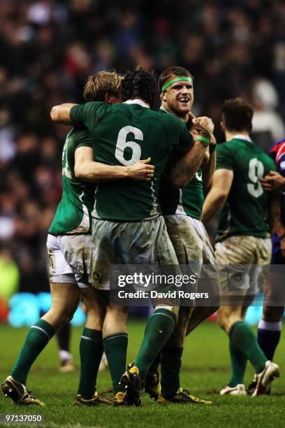 Jamie Heaslip and Stephen Ferris of Ireland celebrate victory after the RBS Six Nations match between England and Ireland at Twickenham Stadium on...