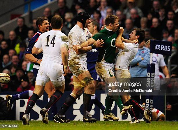 Tomas O'Leary of Ireland and Danny Care of England clash during the RBS Six Nations match between England and Ireland at Twickenham Stadium on...