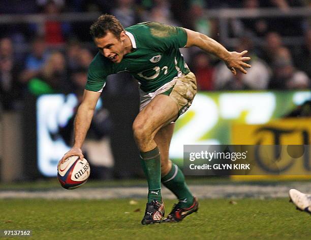 Ireland's wing Tommy Bowe scores a try during the RBS Six Nations International rugby union match between England and Ireland at Twickenham Stadium...