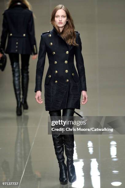 Model walks down the runway during the Burberry Prorsum fashion show, part of London Fashion Week, London on February 23, 2010 in London, England.