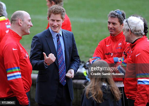 Prince Harry and former England rugby player Lawrence Dallaglio chat with cyclists taking part in the Dallaglio Cycle Slam at Twickenham Stadium on...