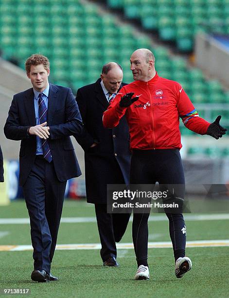 Prince Harry and former England rugby player Lawrence Dallaglio arrive at Twickenham Stadium to welcome back cyclists taking part in the Dallaglio...