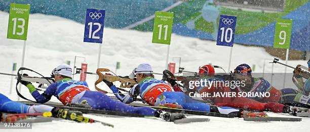 Athletes compete in the men's Biathlon 4 x 7.5 km relay at Whistler Olympic Park during the Vancouver Winter Olympics on February 26, 2010. AFP PHOTO...