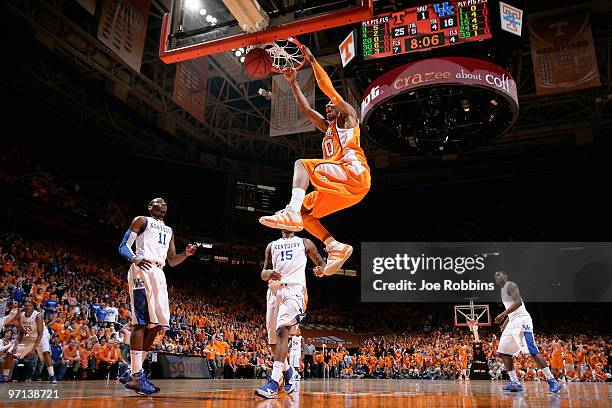 Prince of the Tennessee Volunteers slam dunks the basketball for two of his game-high 20 points against the Kentucky Wildcats at Thompson-Boling...
