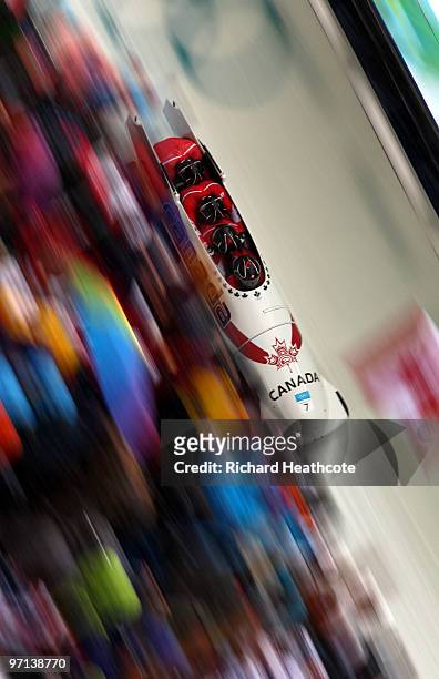 Lyndon Rush, Chris Le Bihan, David Bissett and Lascelles Brown of Canada compete in Canada 1 during the four-man bobsleigh on day 15 of the 2010...