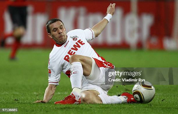 Lukas Podolski of Koeln in action during the Bundesliga match between Bayer Leverkusen and 1. FC Koeln at BayArena on February 27, 2010 in...