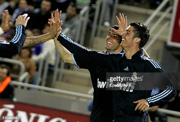 Real Madrid's Brazilian midfielder Kaka celebrates with teammate Real Madrid's Portuguese forward Cristiano Ronaldo after scoring against Tenerife...