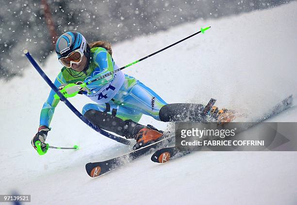 Morocco's Samir Azzimani clears a gate during the Men's Vancouver 2010 Winter Olympics Slalom event at Whistler Creek side Alpine skiing venue on...