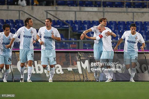 Sebastiano Siviglia and his teammates of SS Lazio celebrate the opening goal during the Serie A match between Lazio and Fiorentina at Stadio Olimpico...